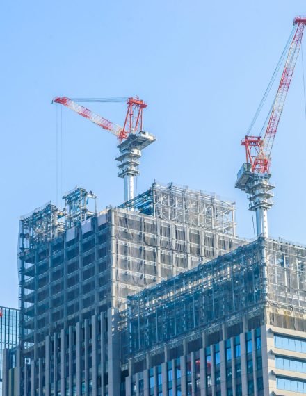 Crane construction building with blue sky background